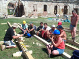 Demonstrating techniques to carpenters in Transylvania